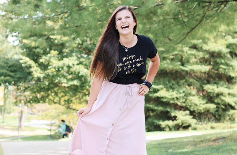 A young woman laughing.